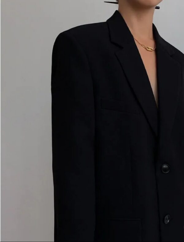 women wearing black color long blazer